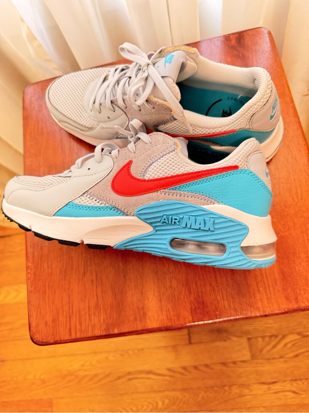 Nike Air Max Light Gray Sneakers with Red and Teal Accents